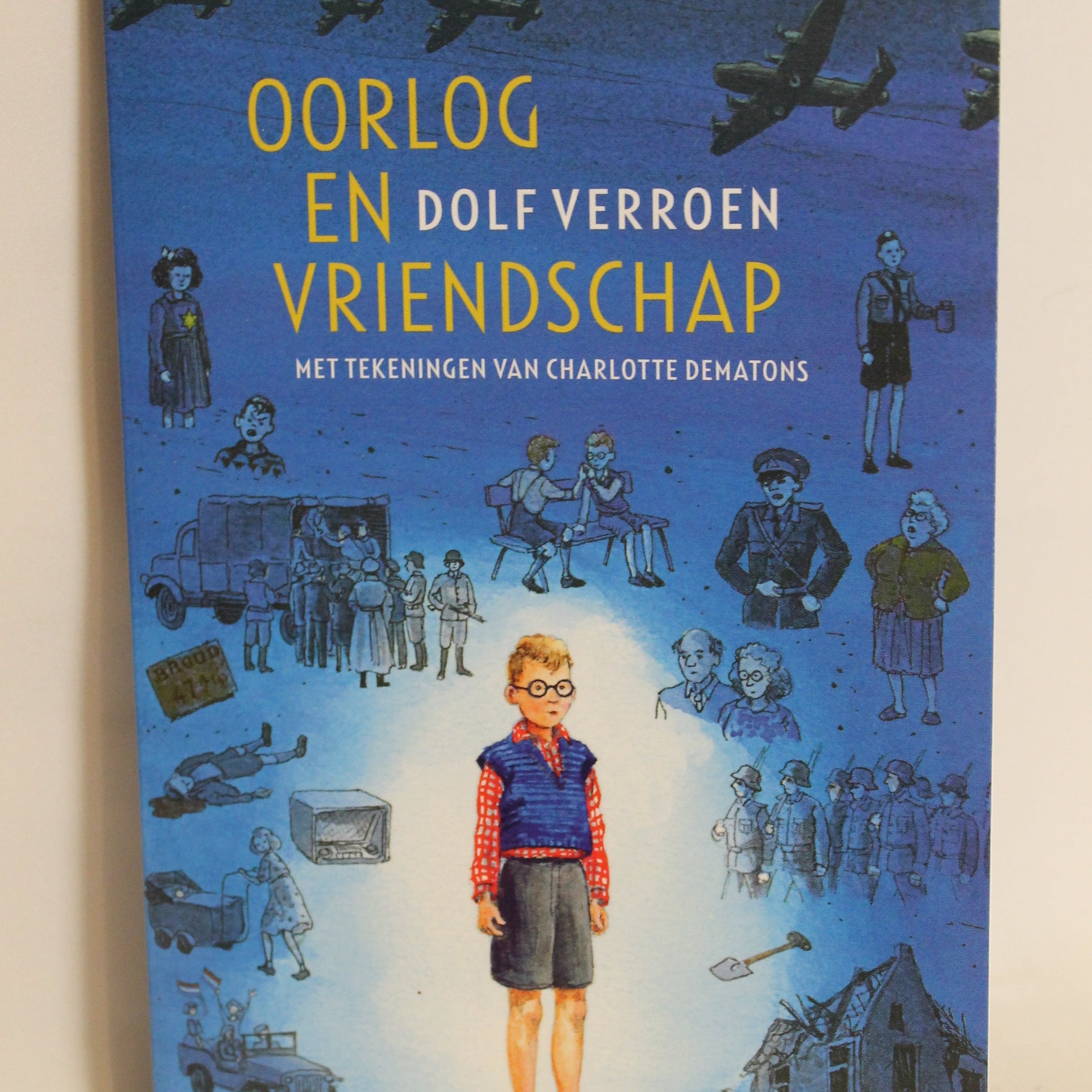 Book cover with illustrations and text on a blue background