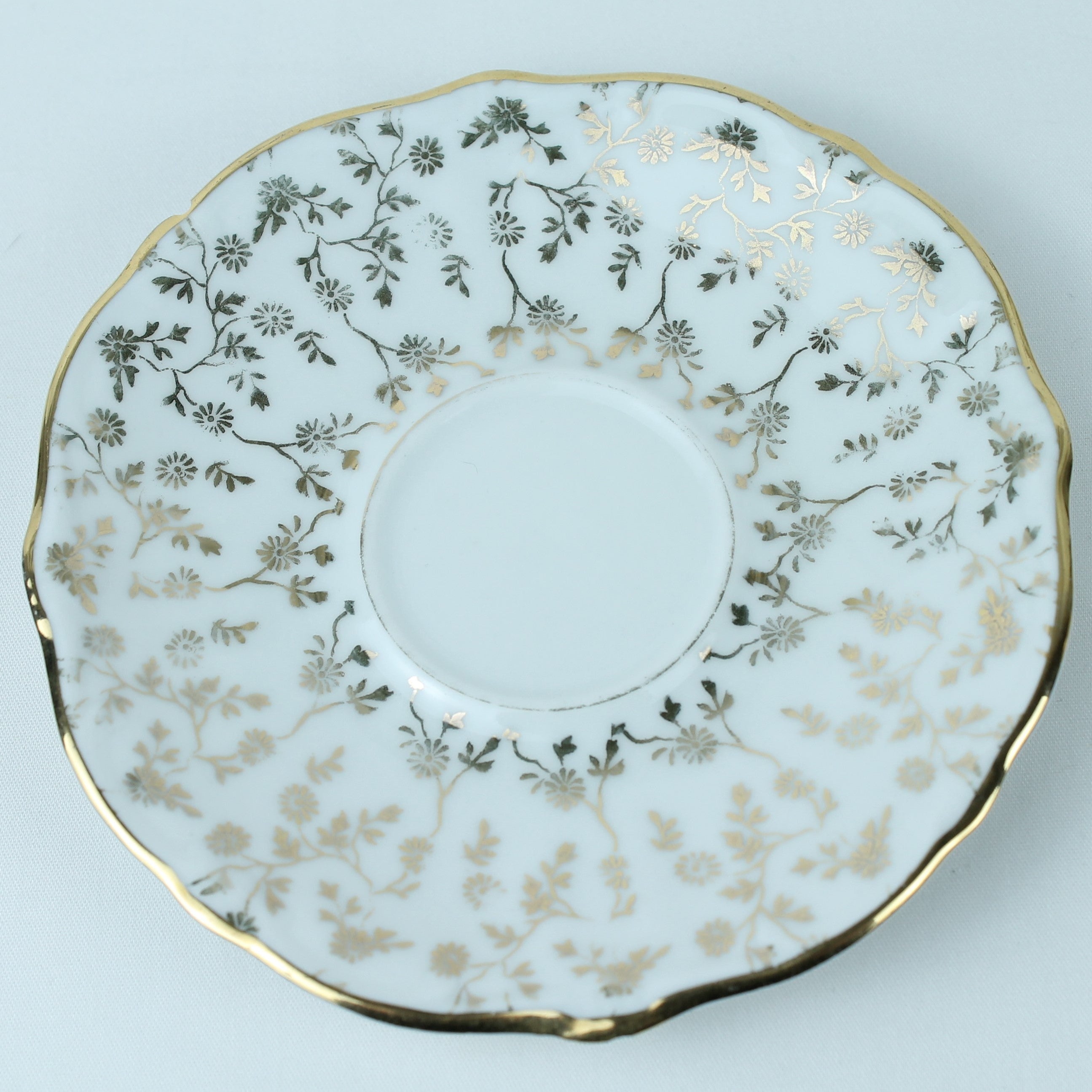 Decorative plate with floral patterns on a light blue background