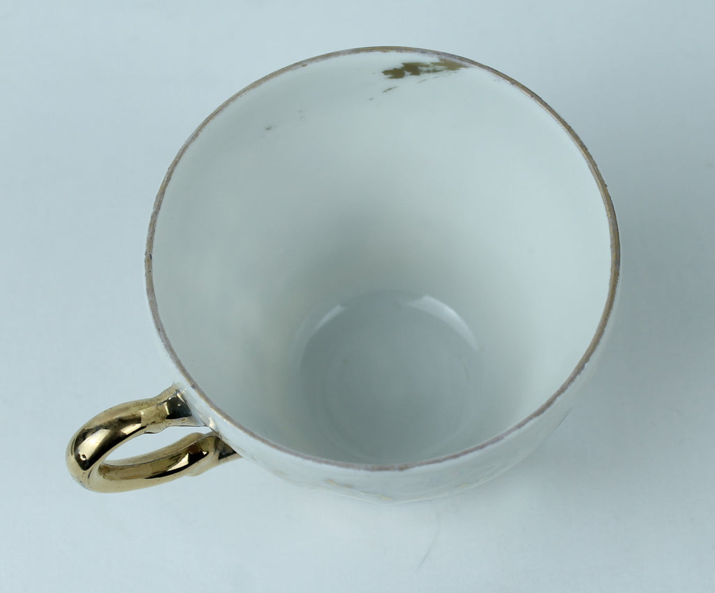 Lustre Porseleinen kopje met parelmoer en bloemmotief