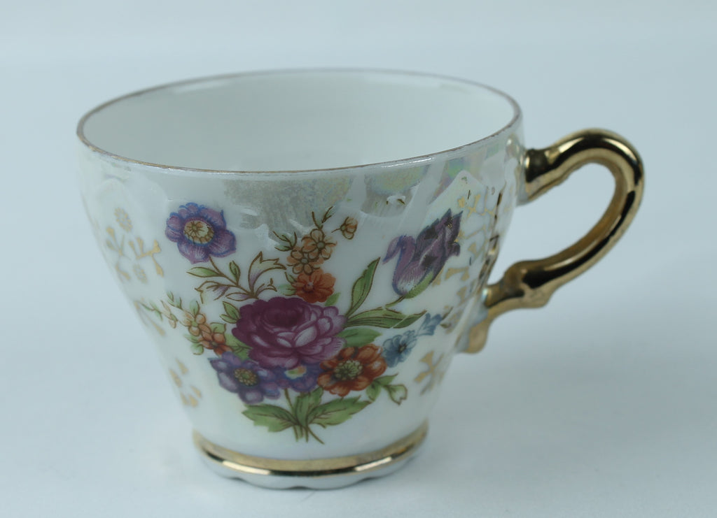 Lustre Porseleinen kopje met parelmoer en bloemmotief
