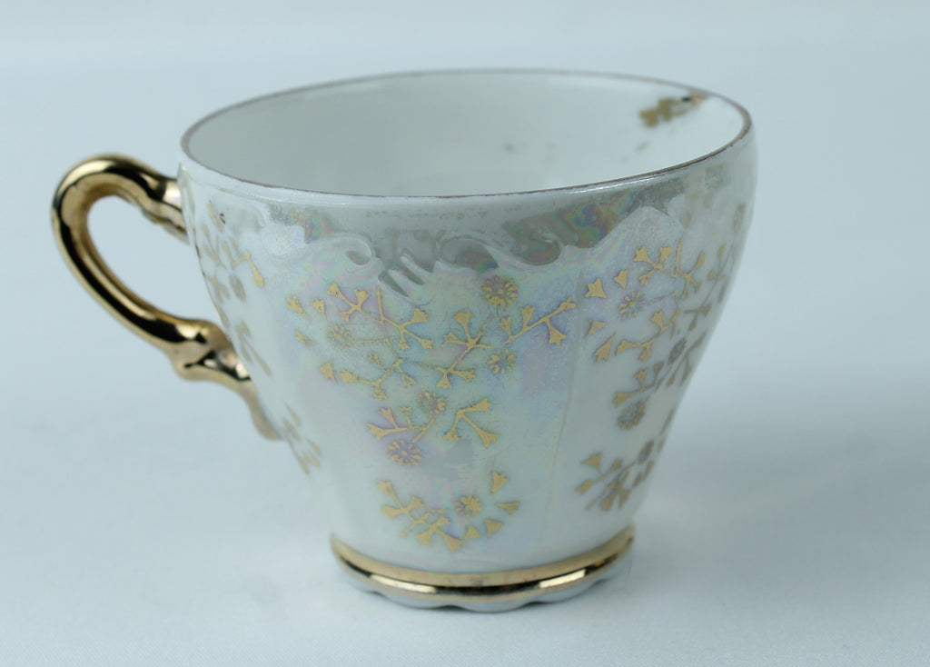 Lustre Porseleinen kopje met parelmoer en bloemmotief
