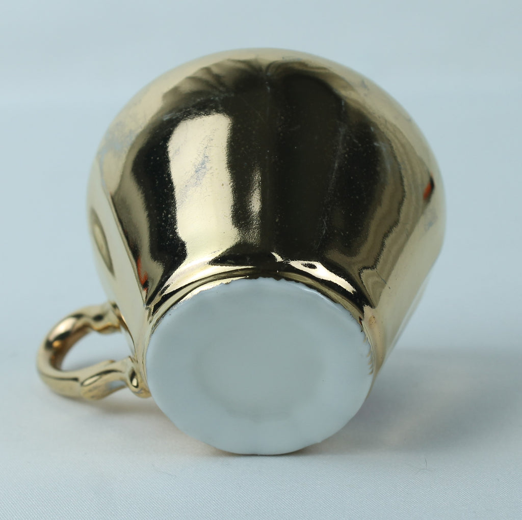 Bavaria, ca. 1930 | Gilded Porcelain Coffee Cup with Romantic Scene