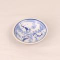 Petit bol bleu et blanc avec motif de poisson (±8 cm) – extérieur vitré marron