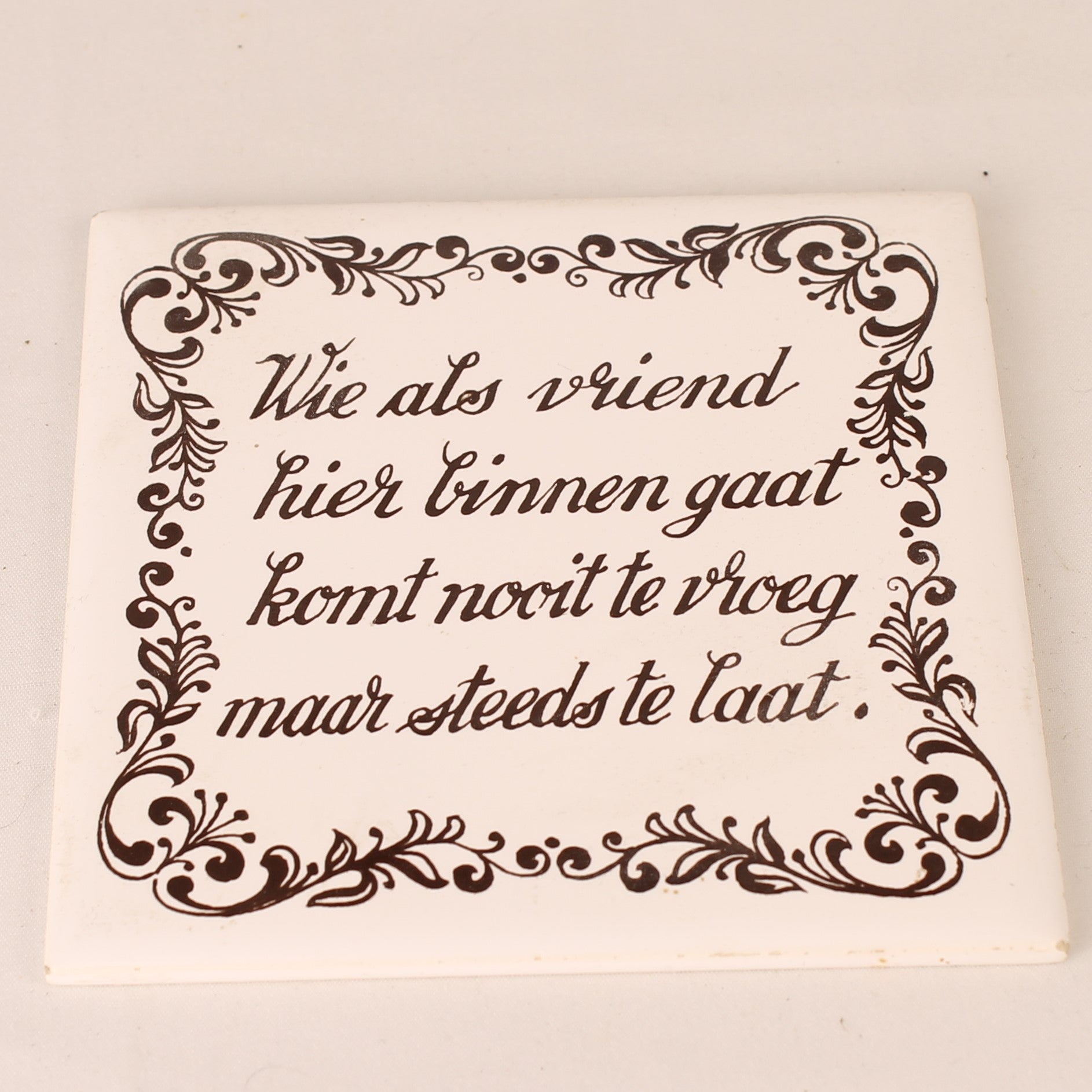 Vintage Wall Tile Saying – "He who enters here as a friend"