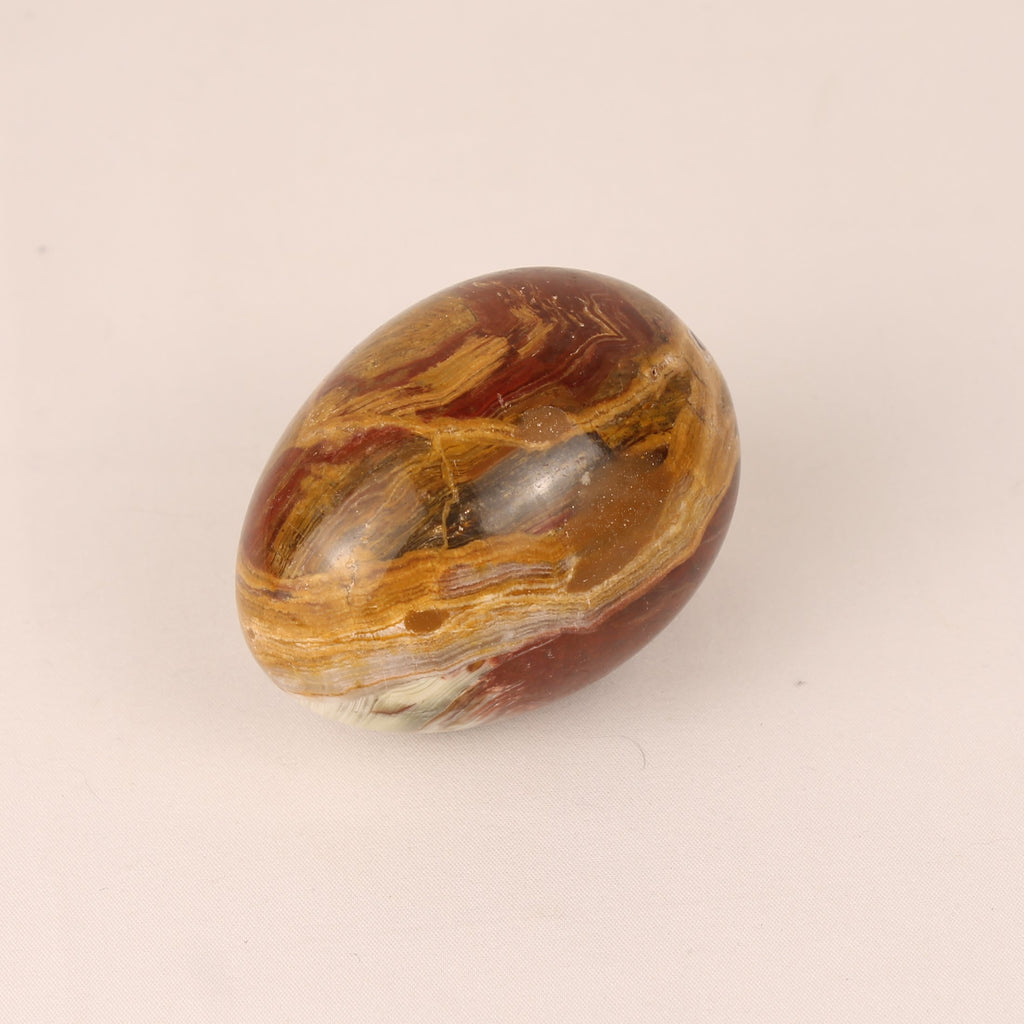 Onyx Natuurstenen Ei 7 cm – Banded Calciet – Roodbruin & Honinggeel