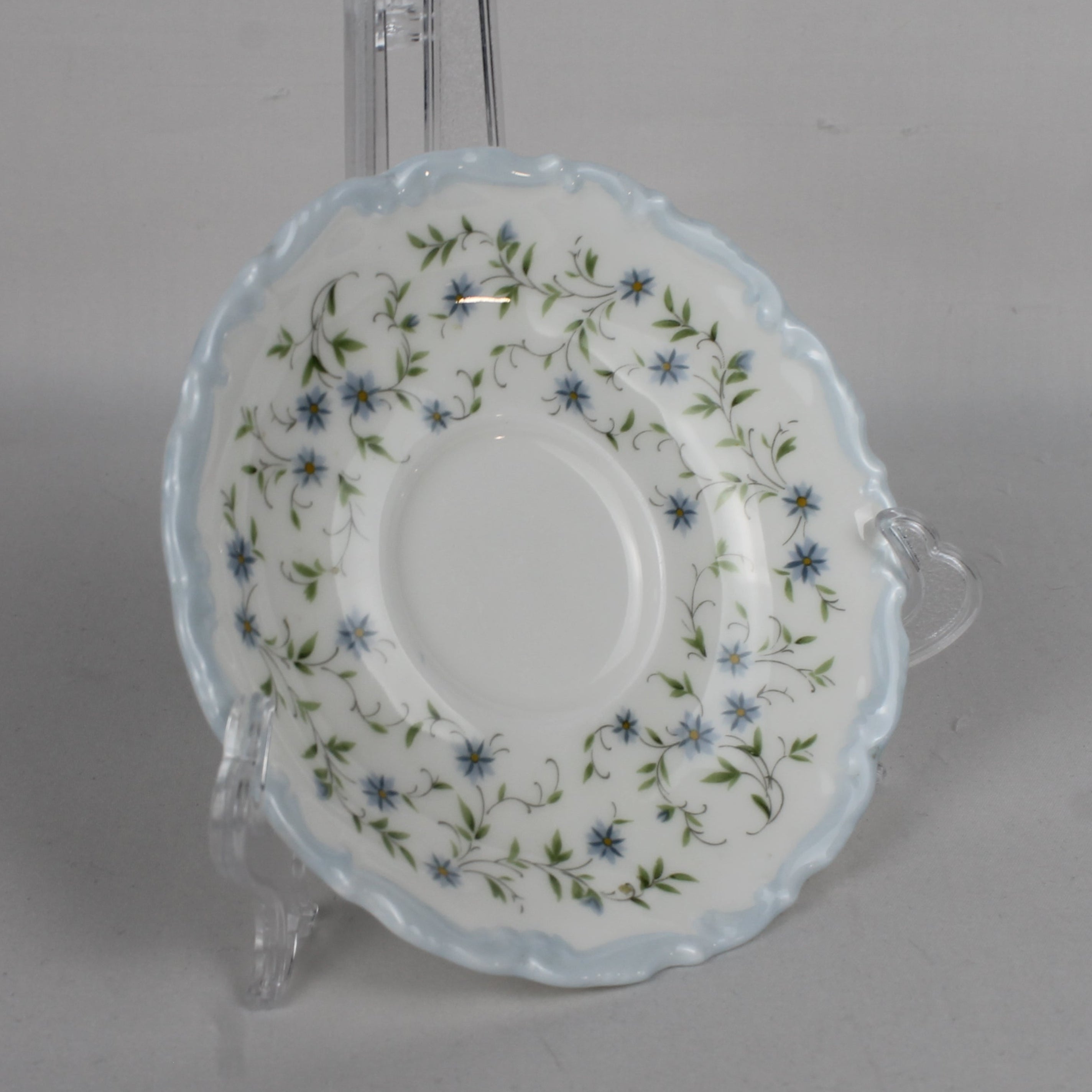 Decorative plate with floral pattern on a gray background