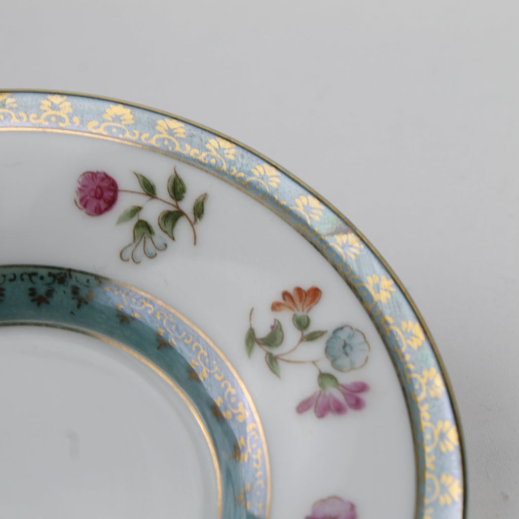 Decorative plate with floral patterns on a plain background
