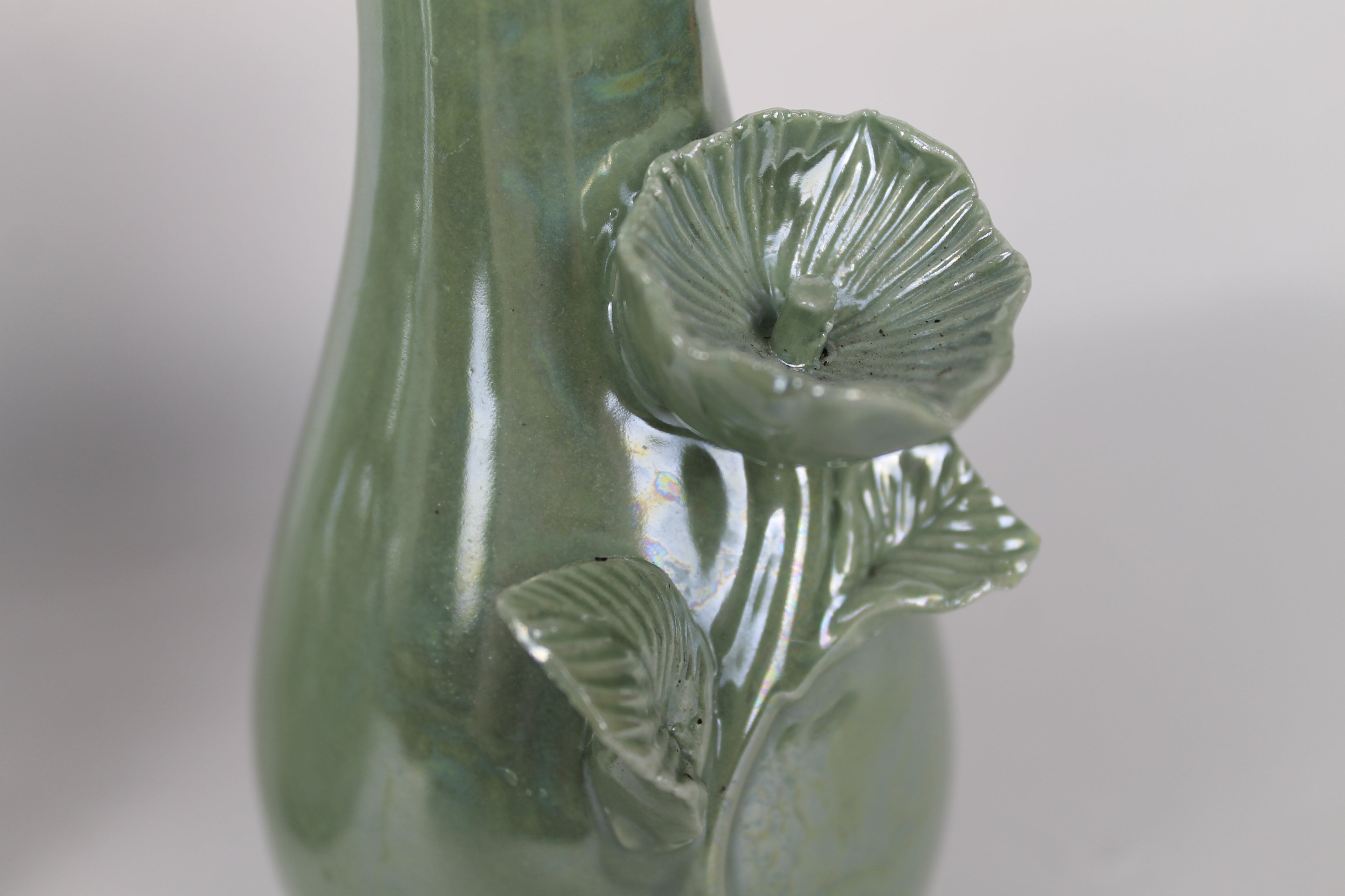 Set of two: Green ceramic vases with flowers | Gloss glaze